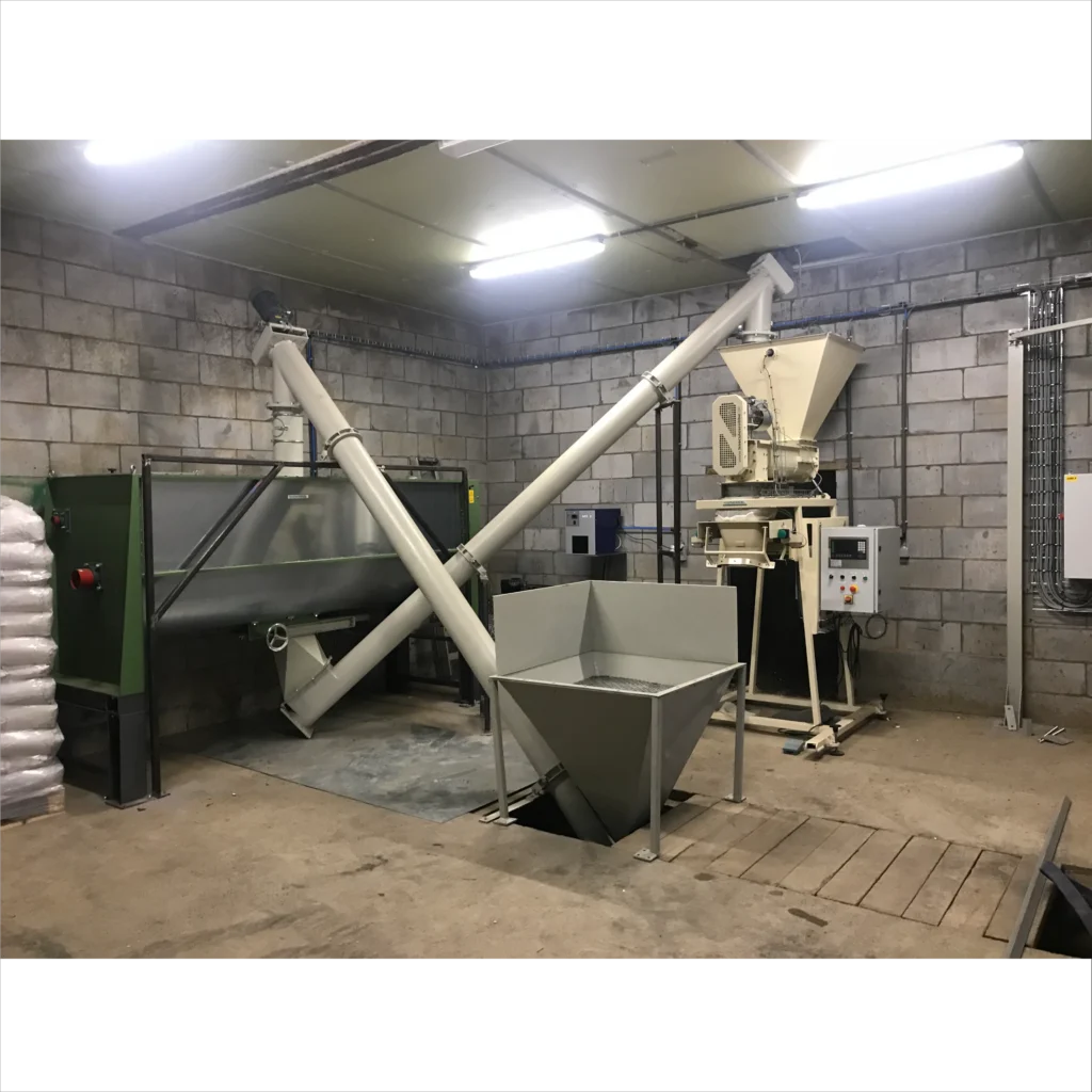 Menginstallatie met lostrechter, diverse schroeven en afzakinstallatie